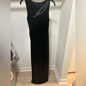 Adrianna Papell sleek black dress with chest slit and gems